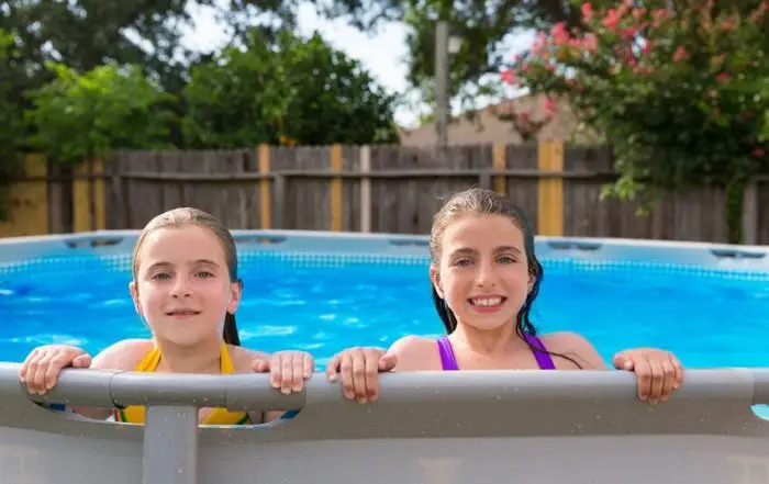 two kids in pool